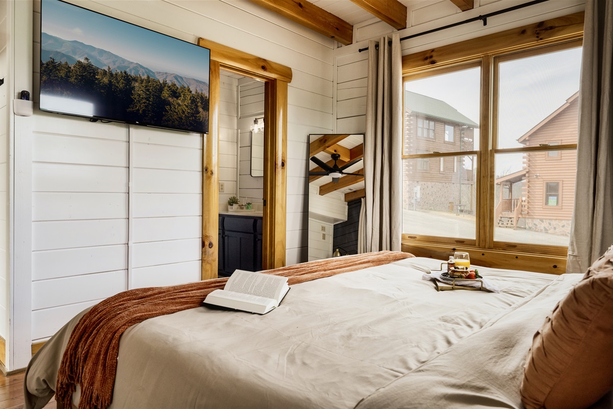 Embracing the cozy vibes: King bed + Roku TV = Perfect combo for a night of endless entertainment and relaxation!