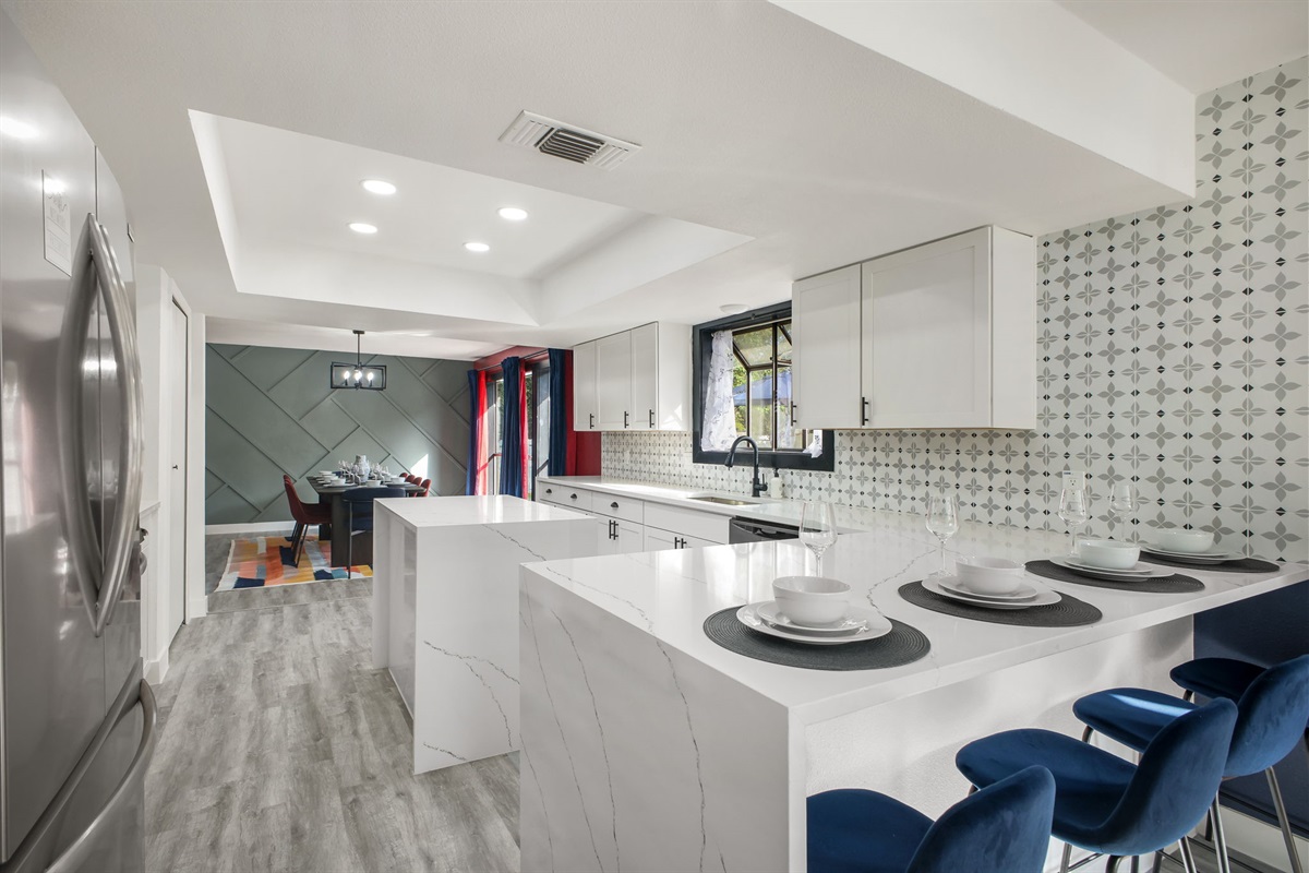 Full Kitchen: Dual islands, prep space plus a breakfast bar for casual dining.