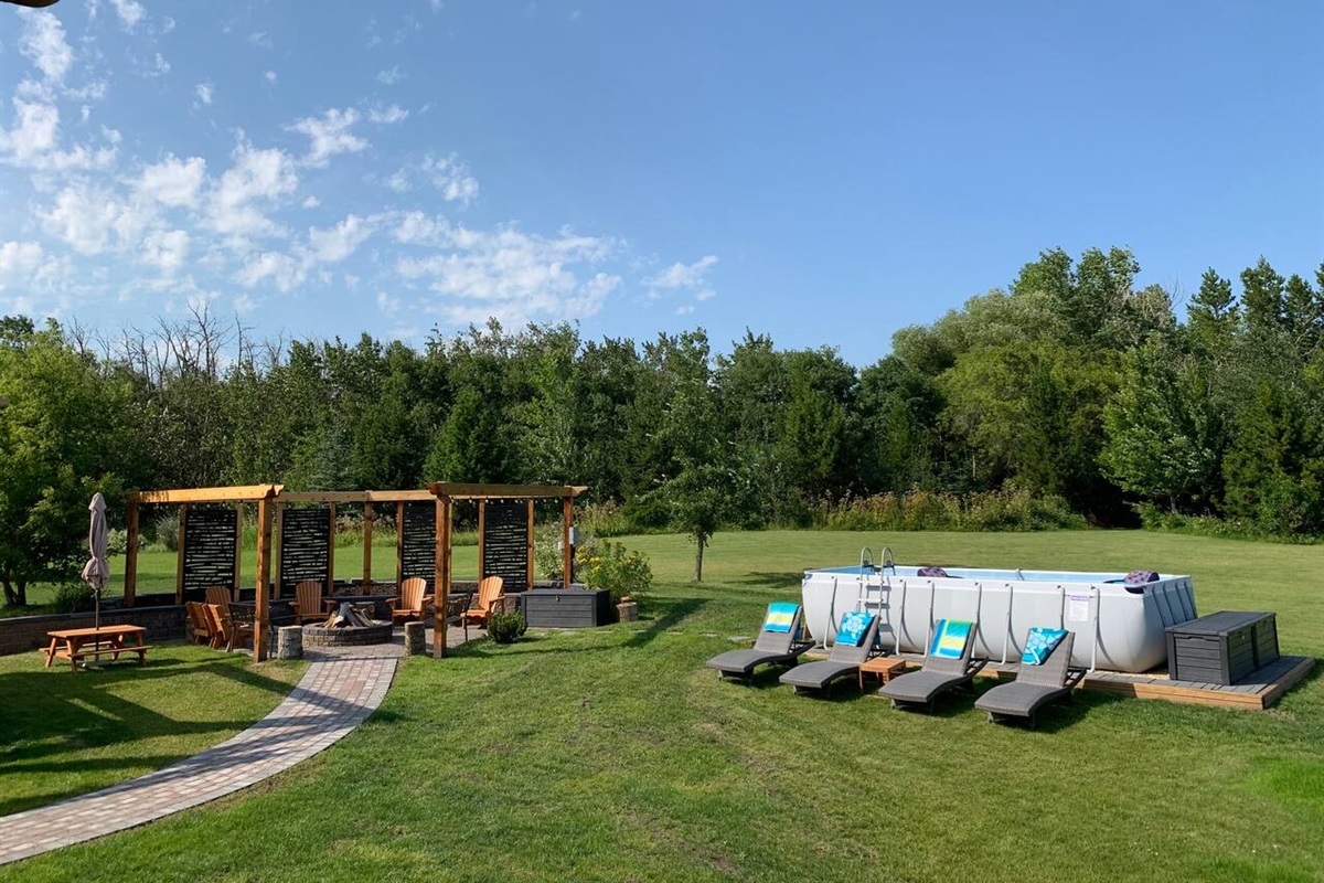 FIRE PIT AREA AND SEASONAL POOL.