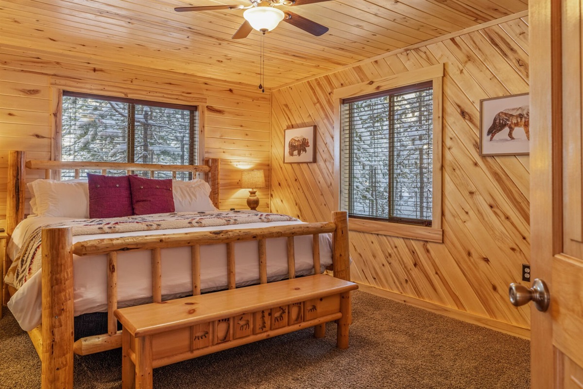 Master bedroom w/ king sized bed and private ensuite bathroom