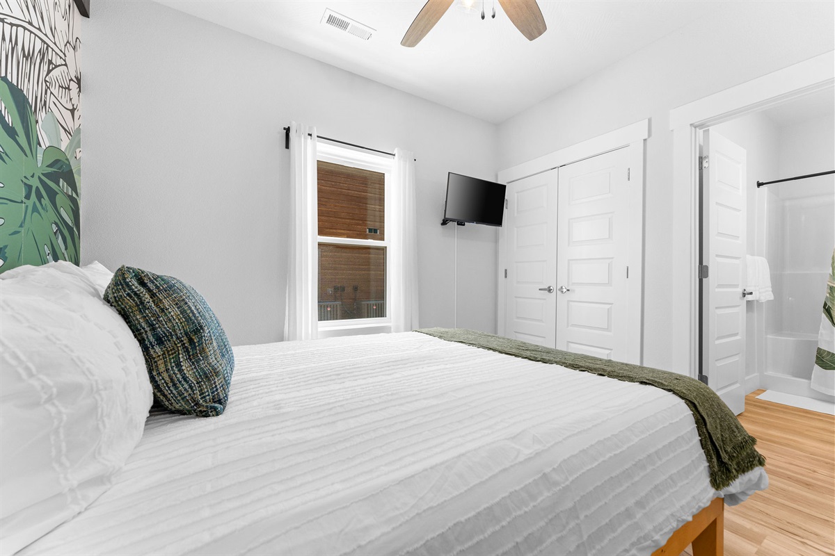 Lower level queen bedroom w/ ensuite bathroom