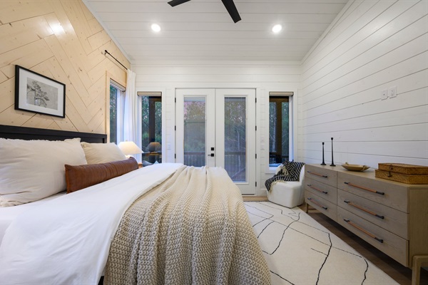 A stylish sliding barn door leads to the spa-inspired ensuite bathroom.