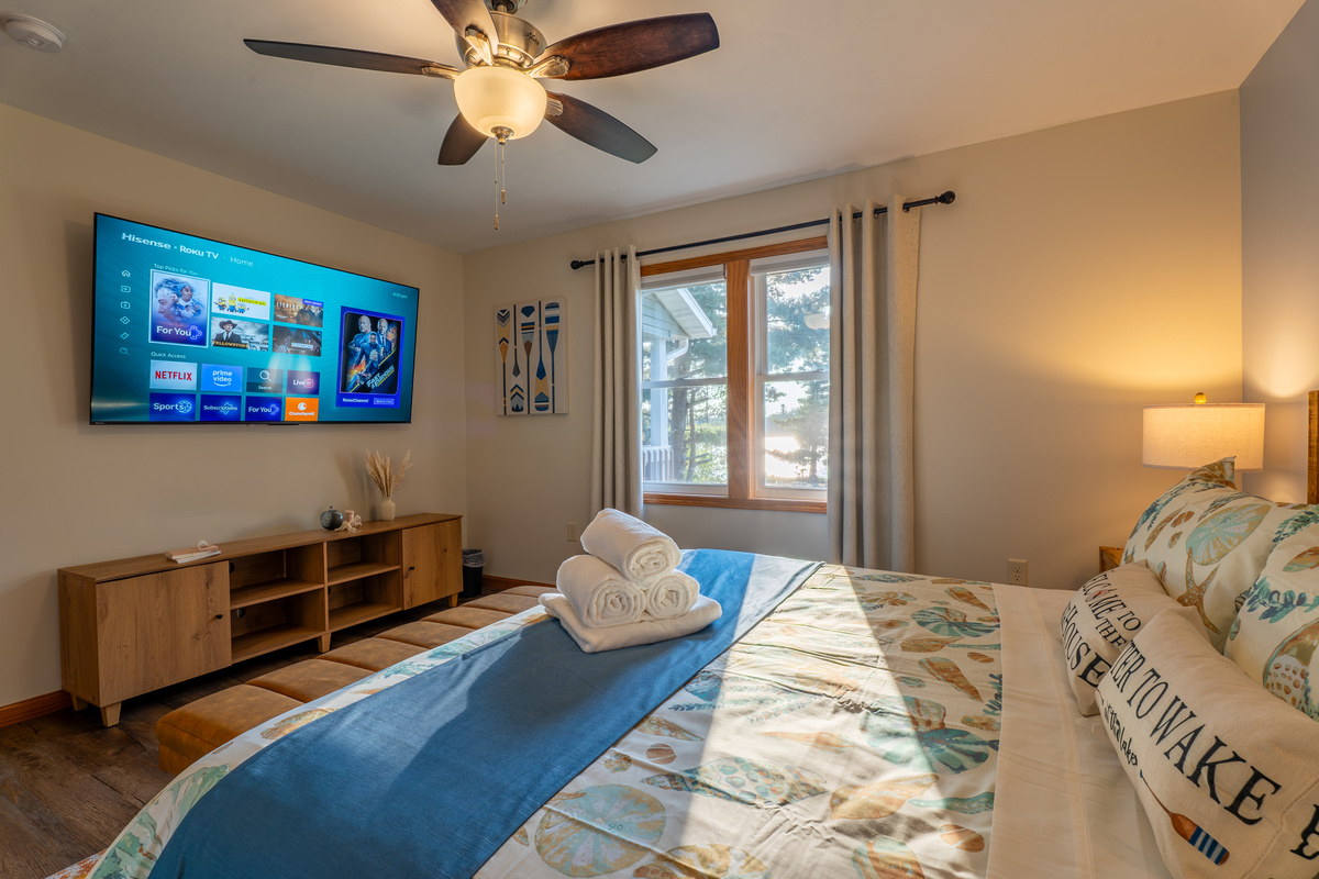 West-facing windows in the master suite mean you wake up to the sound of loons and fall asleep to the last light on the lake