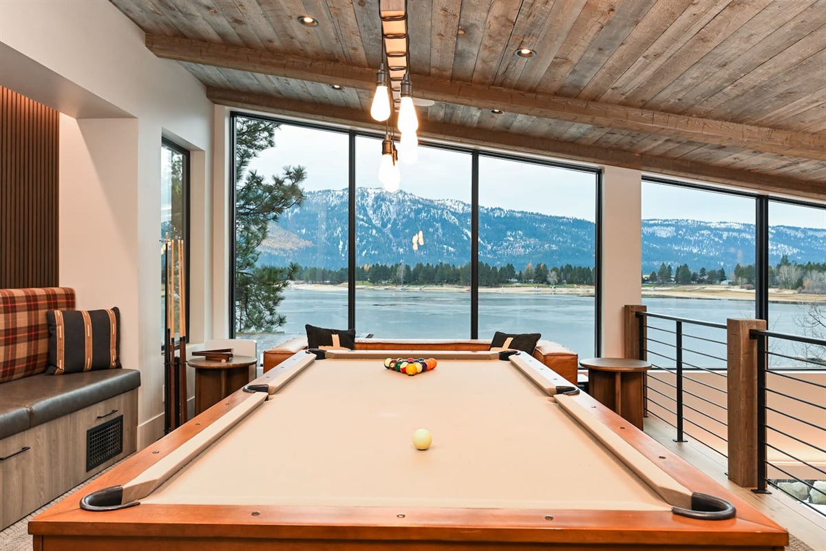This billiards area offers the perfect blend of fun, relaxation, and style