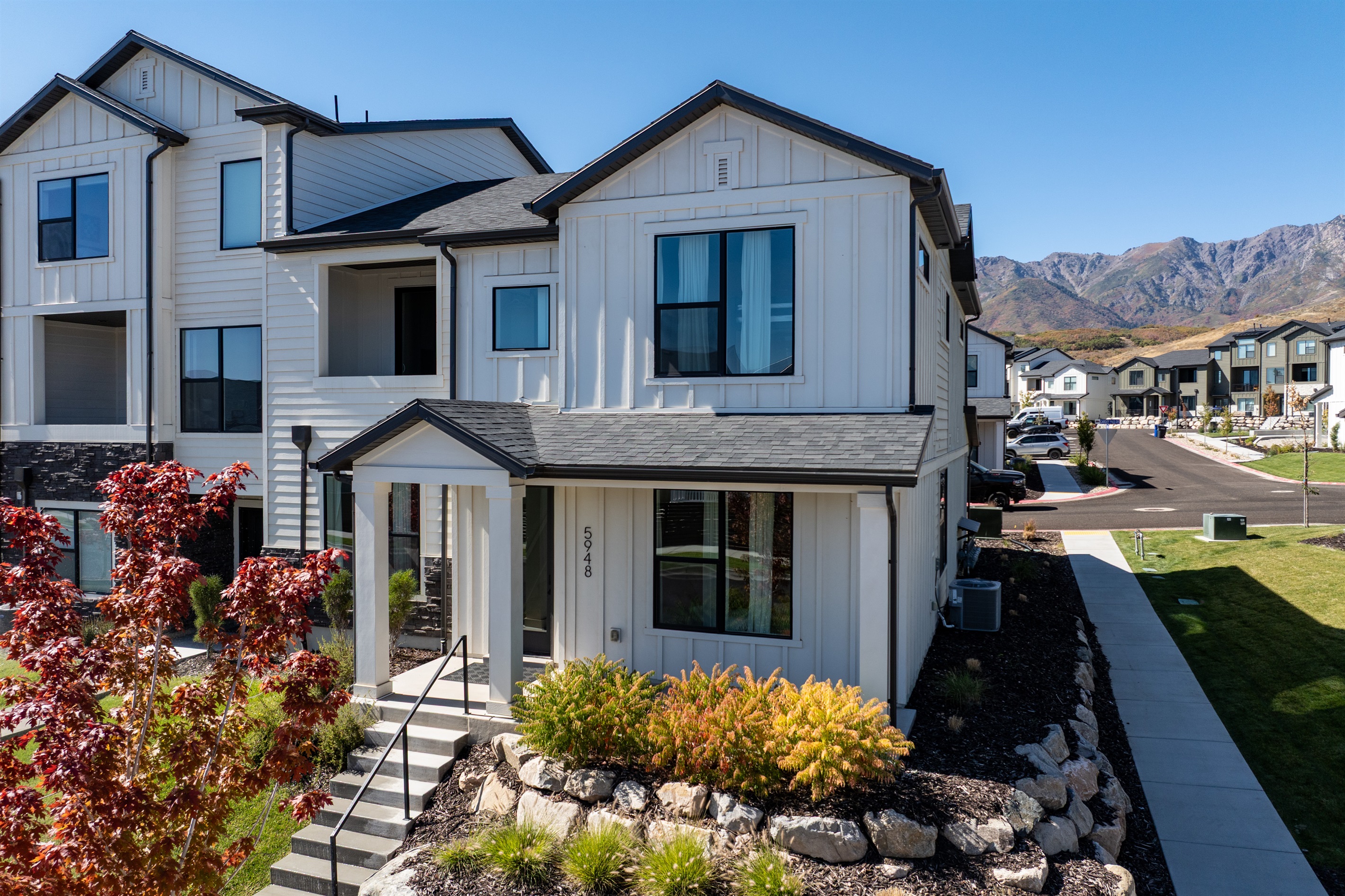 Bird’s-eye view of the property showcasing its prime corner location.