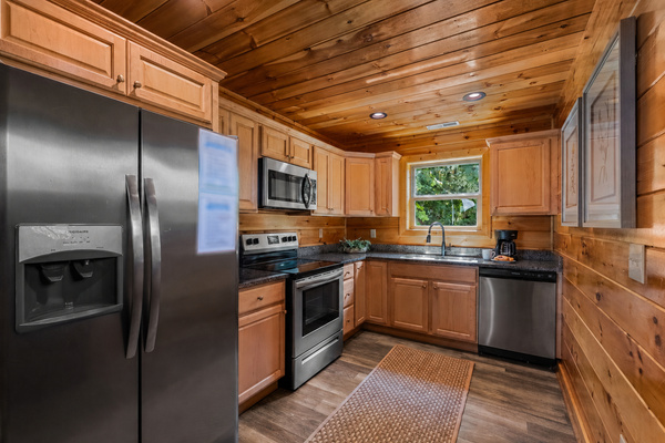 Fully-equipt kitchen with stainless appliances