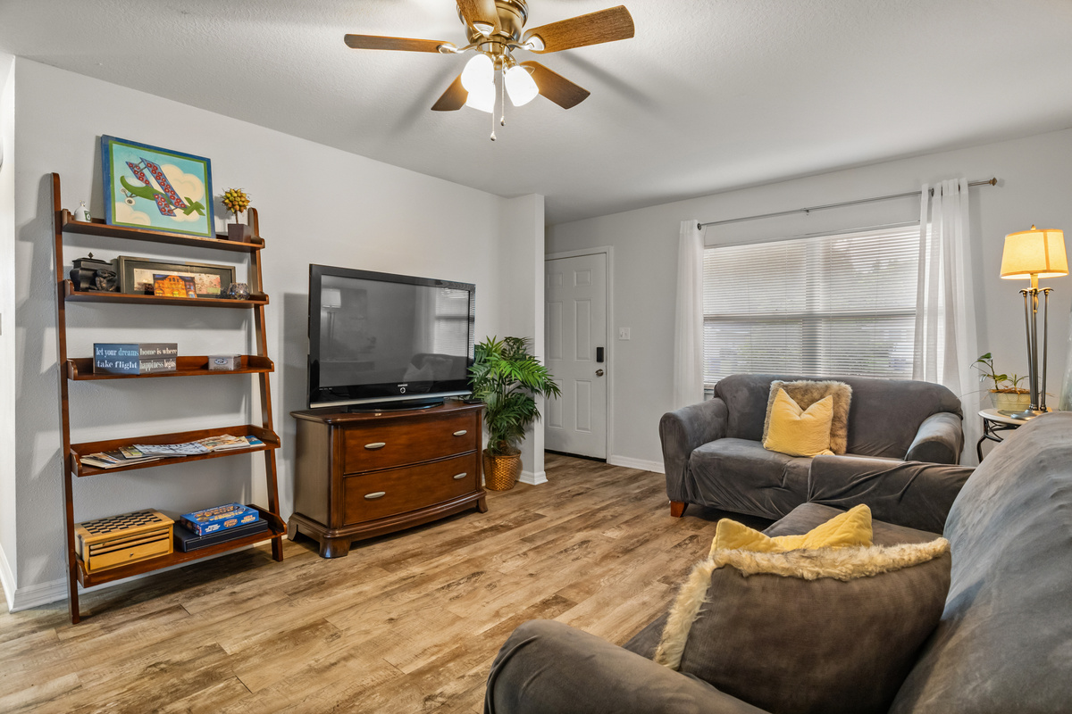 Unit #2 Right: Entryway. Family Room. 50 inch TV.