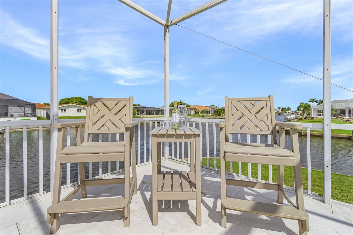 Enjoy a cocktail as you take in the vibrant sunset and mesmerizing water views!