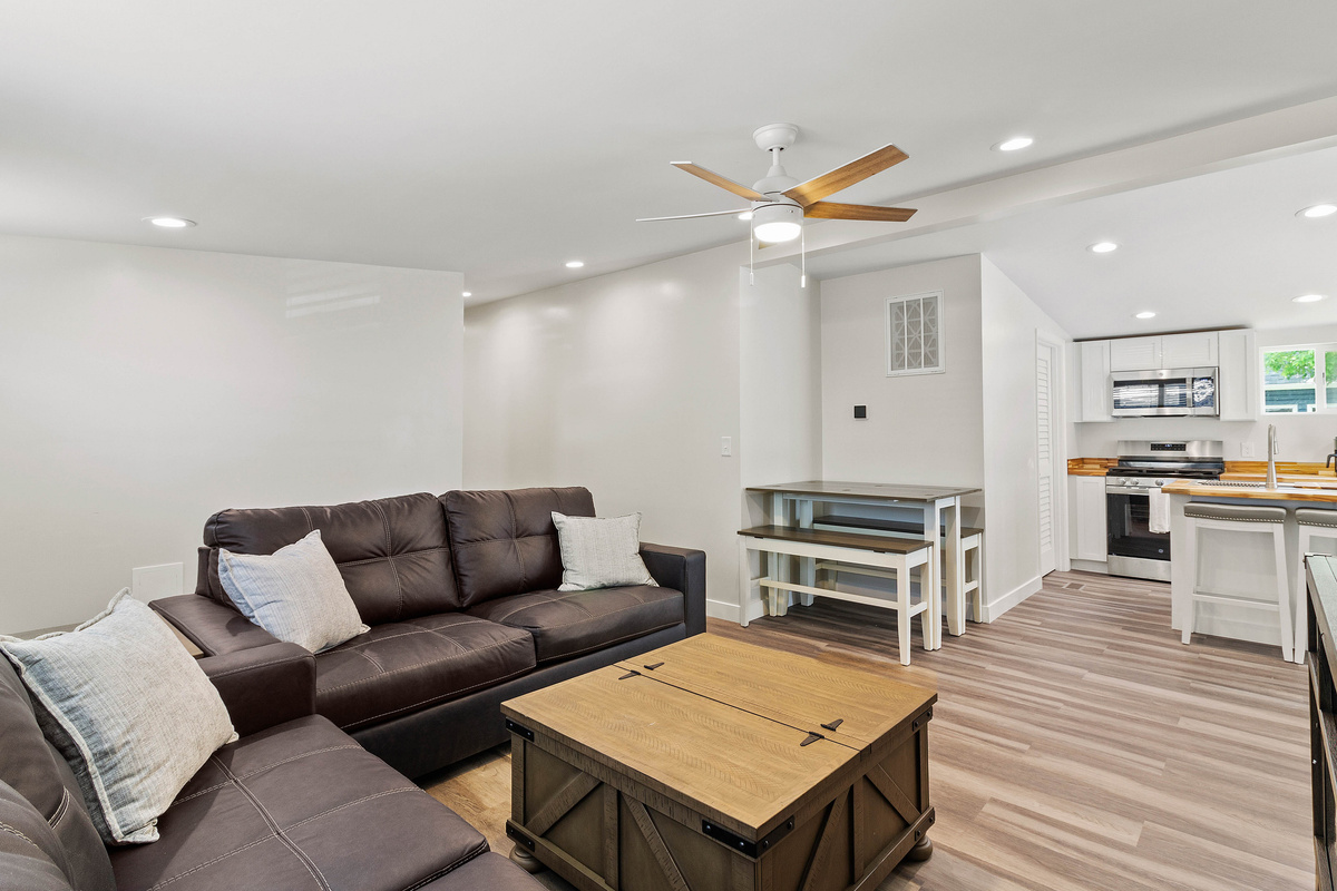 The Waterbury Way - Living Room with dining table