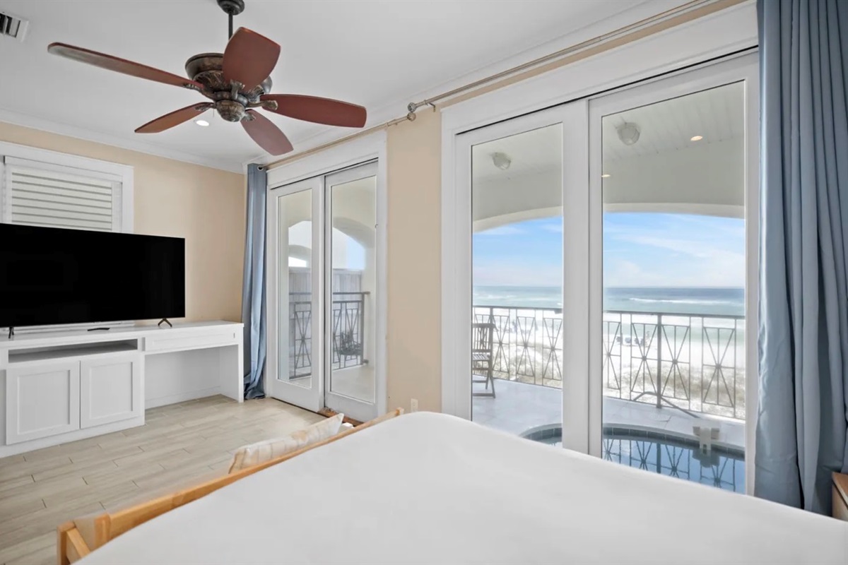 Second Master (1st Floor) with KING bed, ensuite bathroom with shower/tub combo, Gulf Views, balcony access, Smart TV