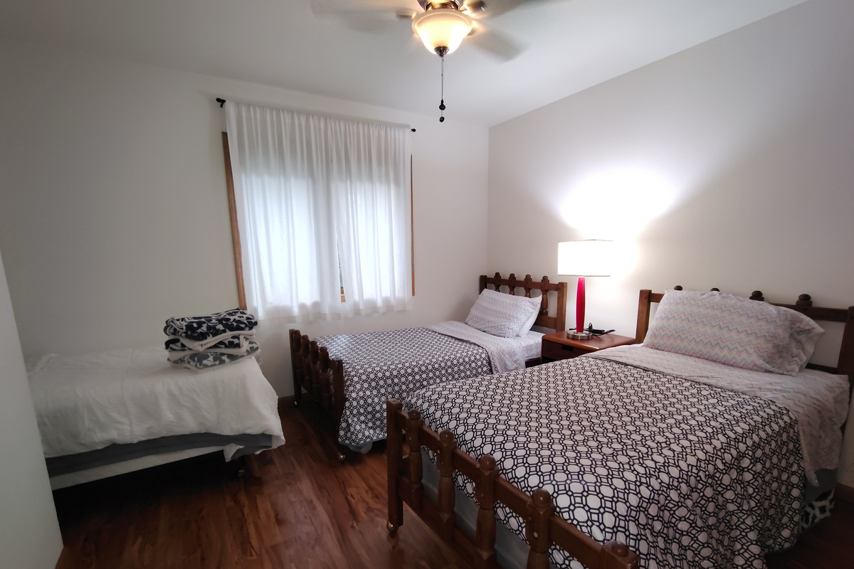 Bedroom With Three Twin Beds - Main Level