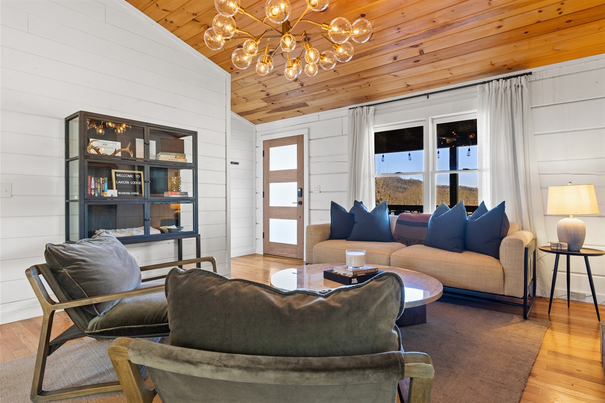 The living room offers a perfect spot to relax, with comfy seating and a cozy ambiance.