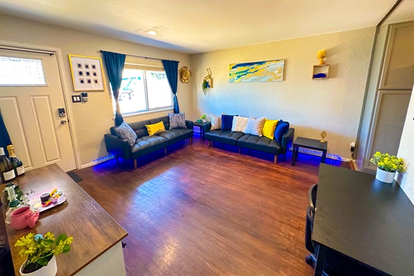 Gather the family in our inviting living room with plush couches and a TV for quality bonding time.