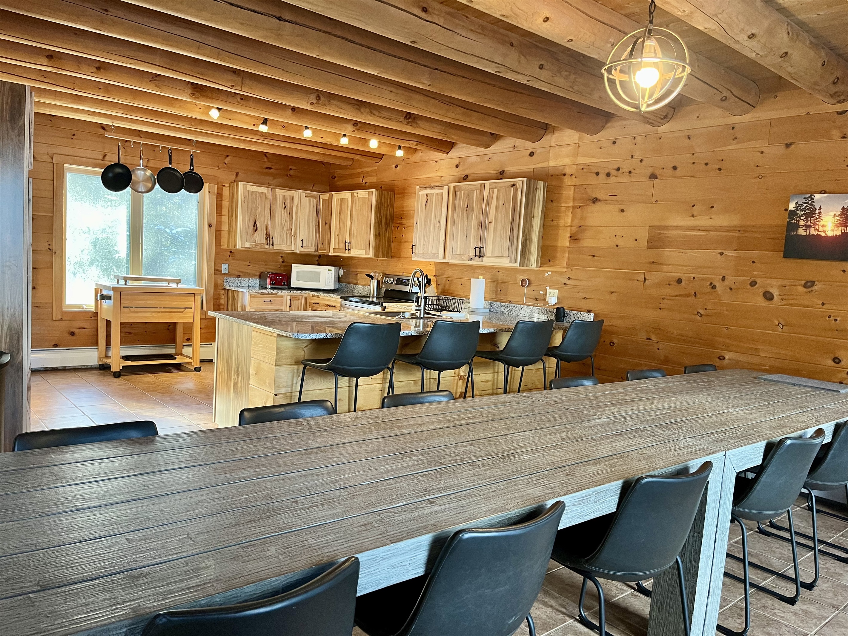 Expansive dining table seats 12 people plus 4 at the kitchen counter. We never forget the littles! Optional infant high chair for the dining area, and that's one less thing to have to pack. The kitchen is also equipped with some children's plate sets.
