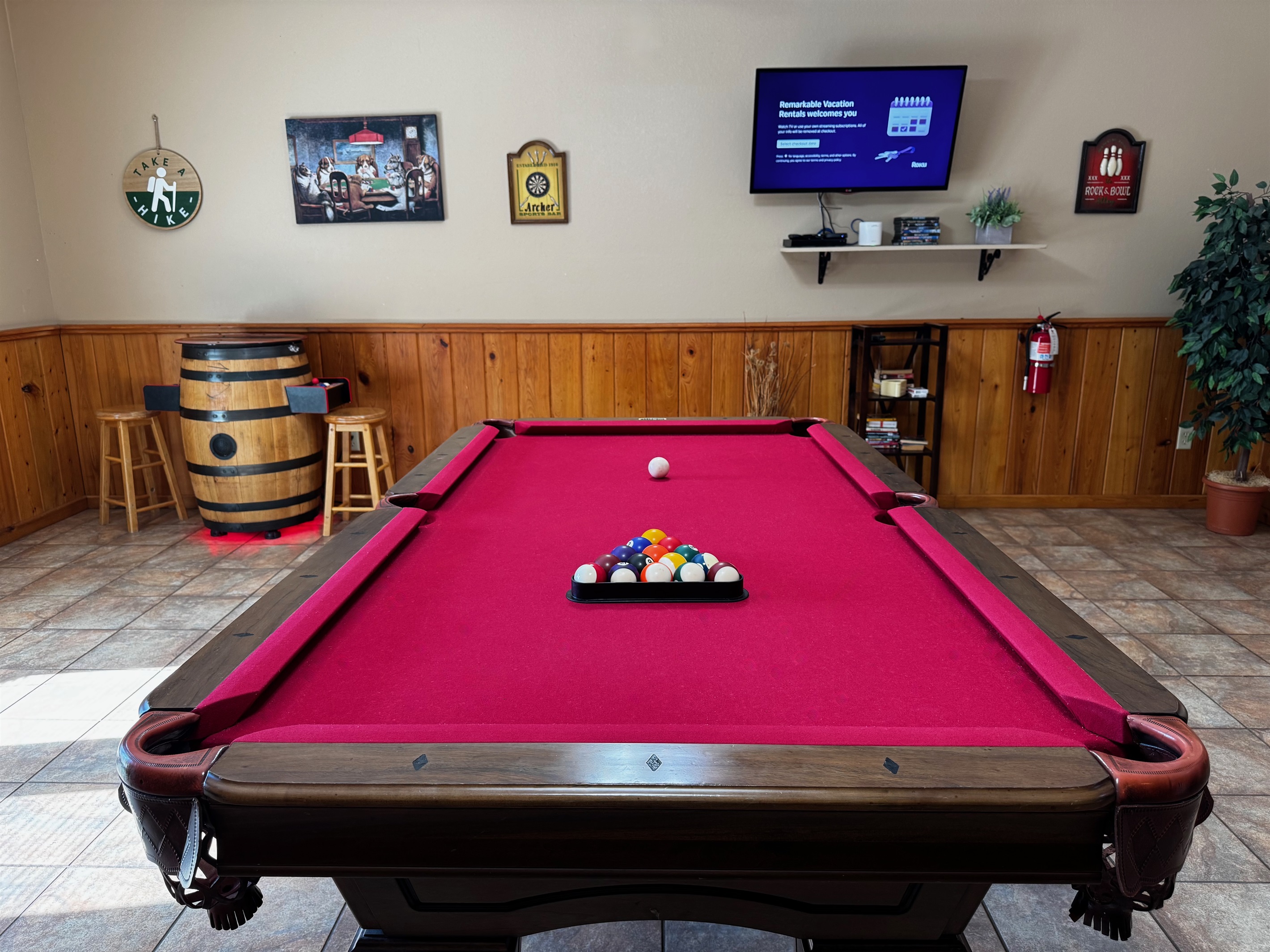 Billiards, football, arcade system, large TV, table, games, and more to help people stay busy -- if they choose!