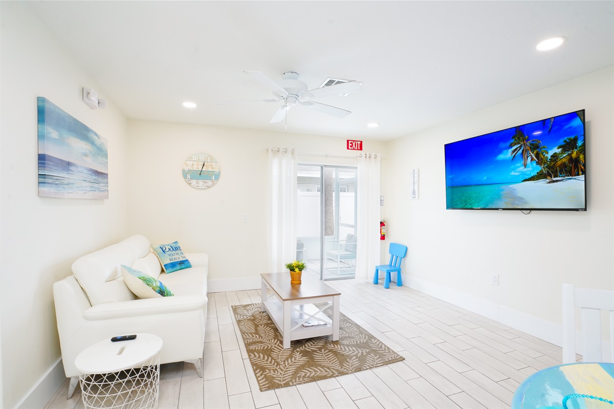 Unit B also has two living rooms each with a smart TV.