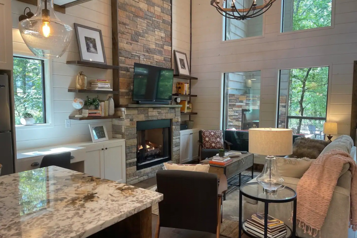 A spacious living room with gas-log fireplace, Roku tv to keep up with your favorite shows, and a desk area just in case you can't fully escape from work. 