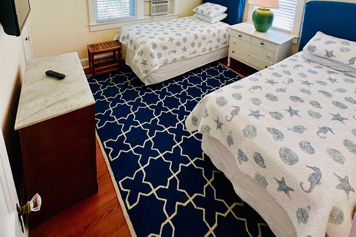 First floor twin room with television 