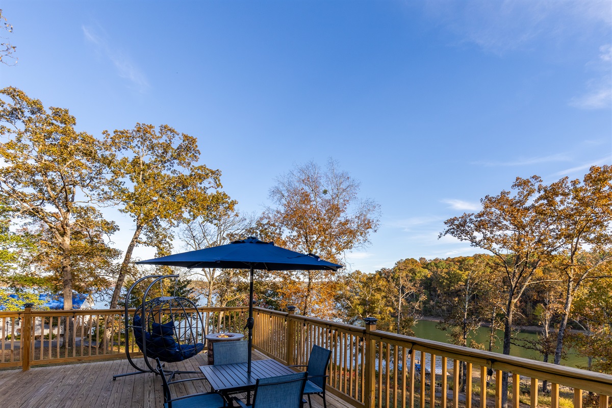 njoy morning coffee or sunset drinks on your private deck overlooking the lake—complete with fire table and cozy seating