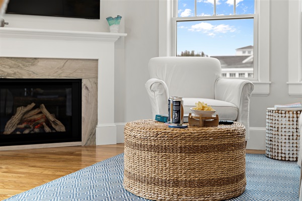 A gas fireplace adds warmth and ambiance to the living space.