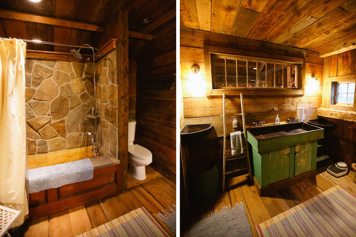 Upstairs full bath with stone lined shower  and old tin tub.
Old horse feeders will hold your toiletries.