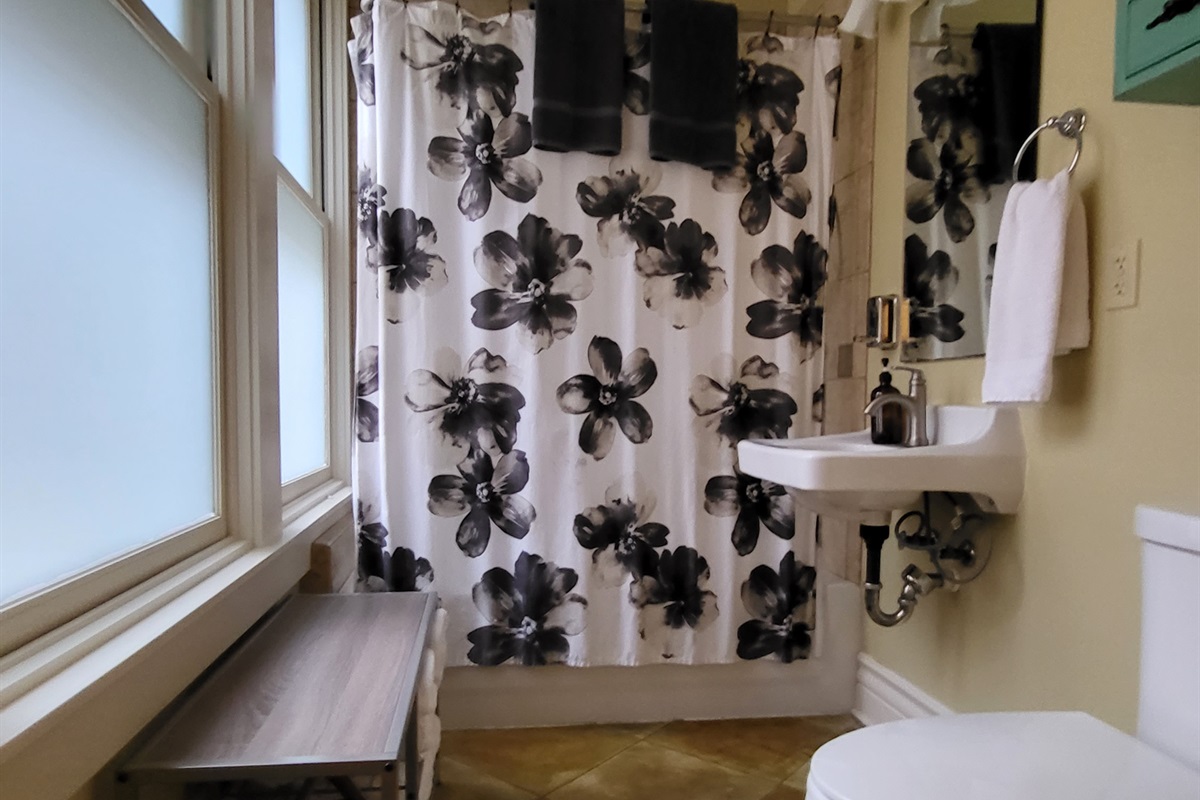 Bright Bathroom with Shower and Tub.