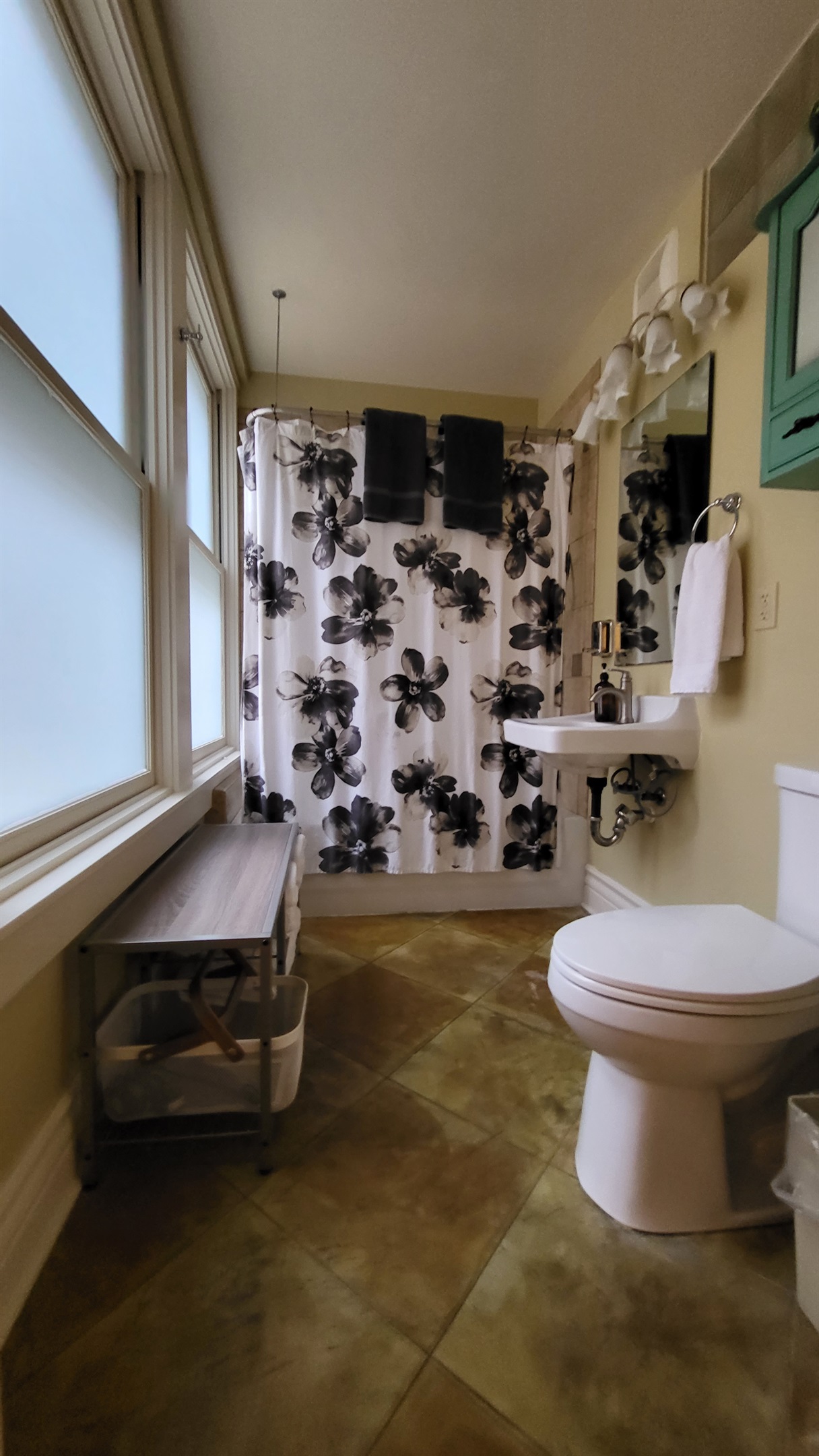 Bright Bathroom with Shower and Tub.