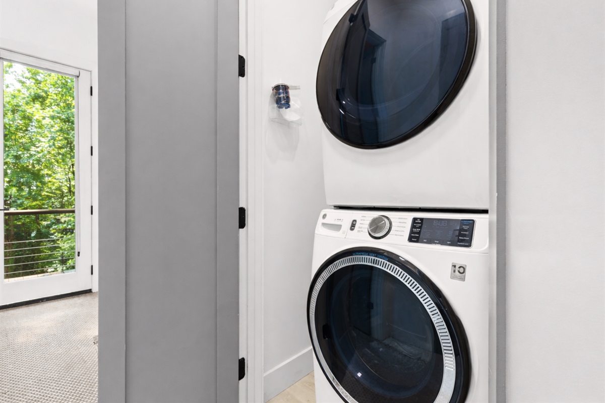 A laundry room equipped with a washer and dryer, making it easy to keep everything fresh during your stay.