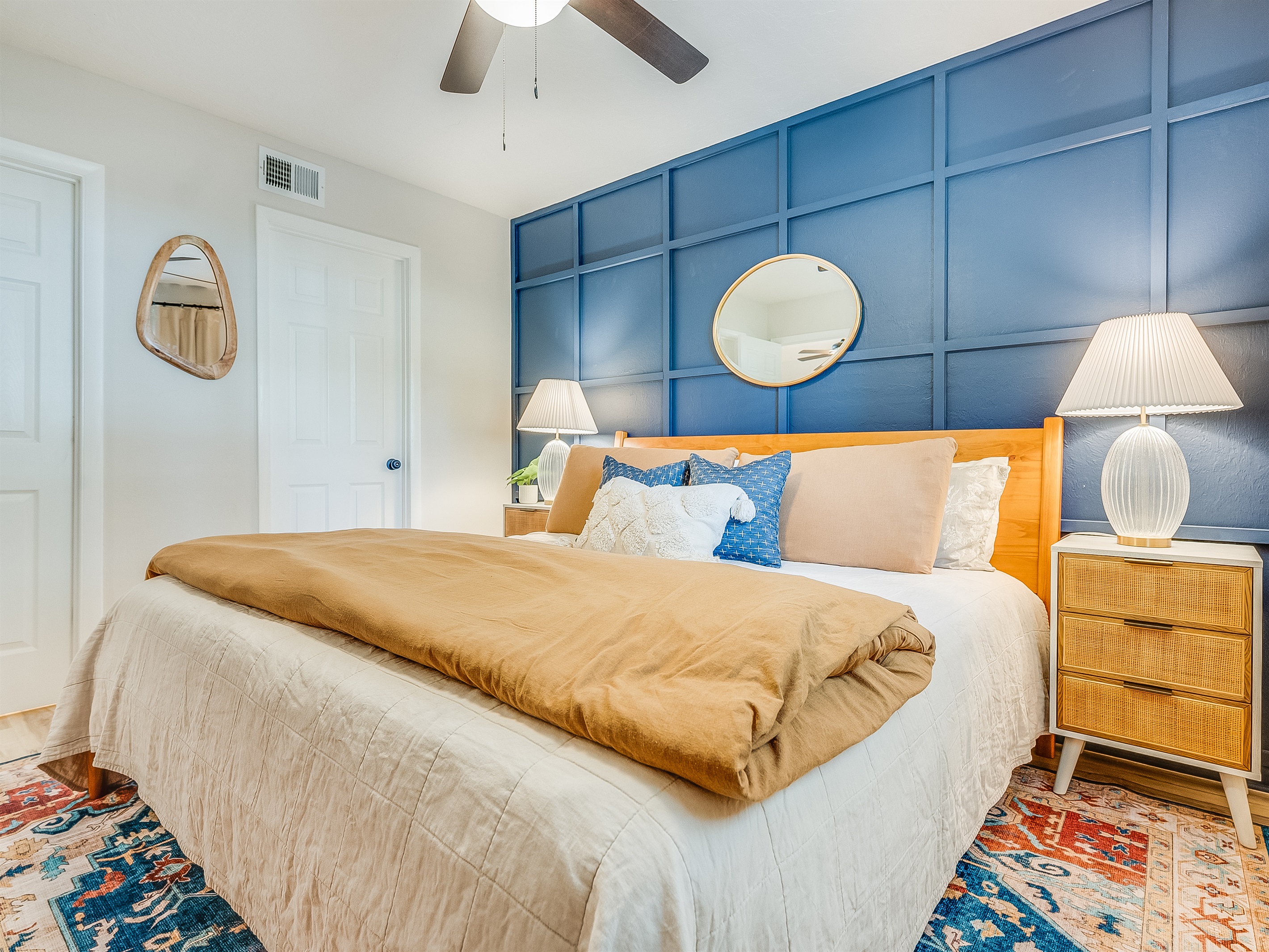 Soft linens and calming tones in this bedroom ensure restful nights.