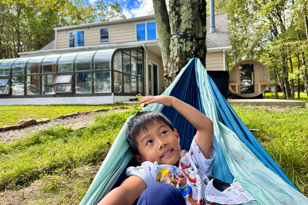 A child’s laughter under a wide open sky — the sound of vacation.