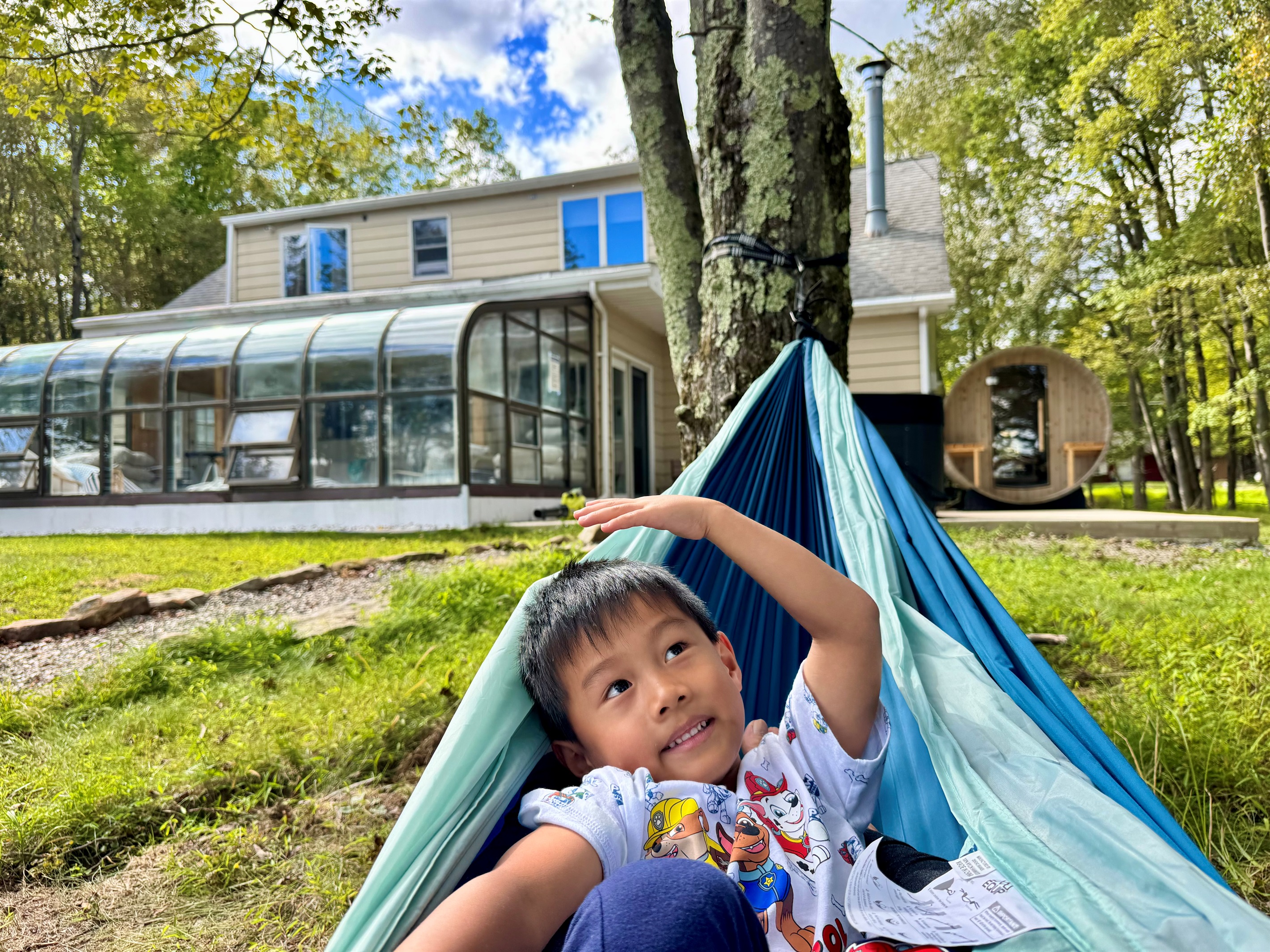 A child’s laughter under a wide open sky — the sound of vacation.