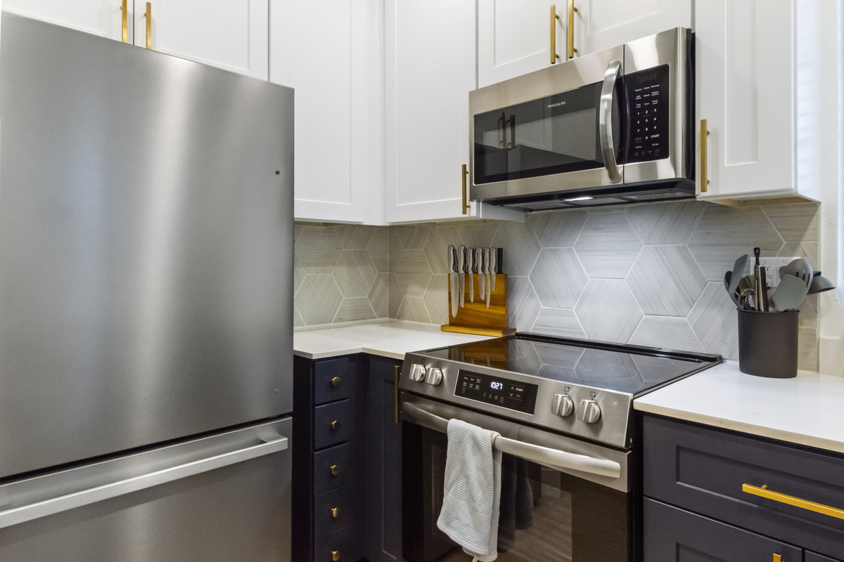 Fully equipped kitchen with modern appliances for family meals.