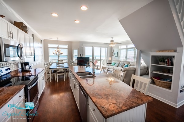 The main level features an open floor plan and a well-appointed kitchen