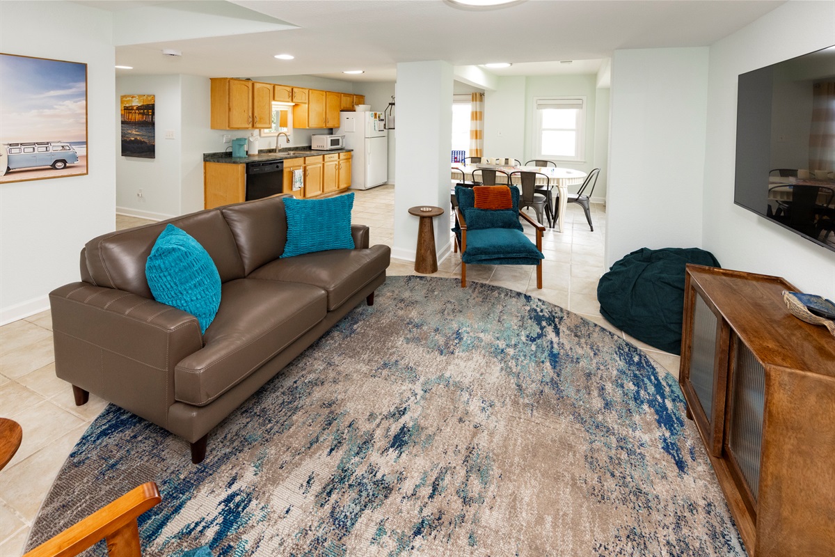 The ground floor kitchenette with a full sized fridge/freezer, dishwasher, microwave, & coffeemaker with immediate access to the pool area helps make cookouts out back super easy!