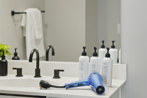 No need to pack extra. A hair dryer and full set of shampoo, conditioner, and body wash are provided for your convenience.