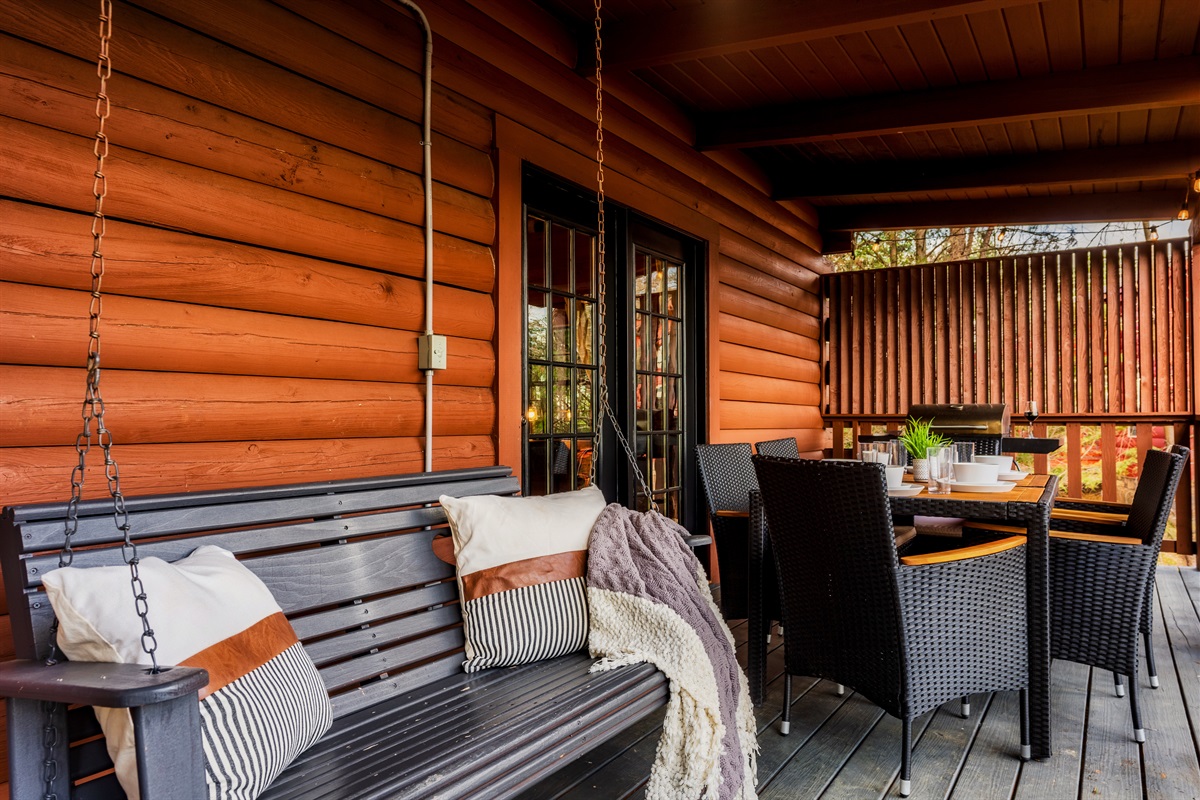 Find your peace on this beautiful wooden porch. Enjoying the outdoors and creating lasting memories.