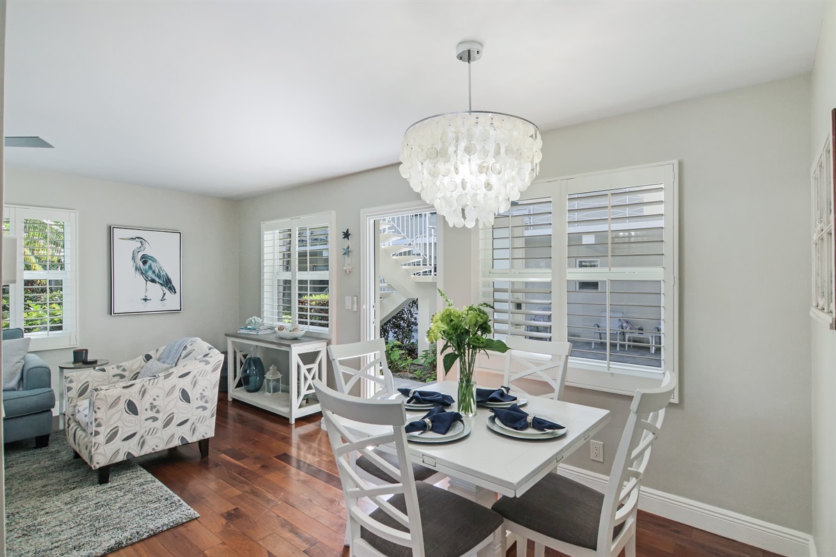Dining seating for 4 with a courtyard view