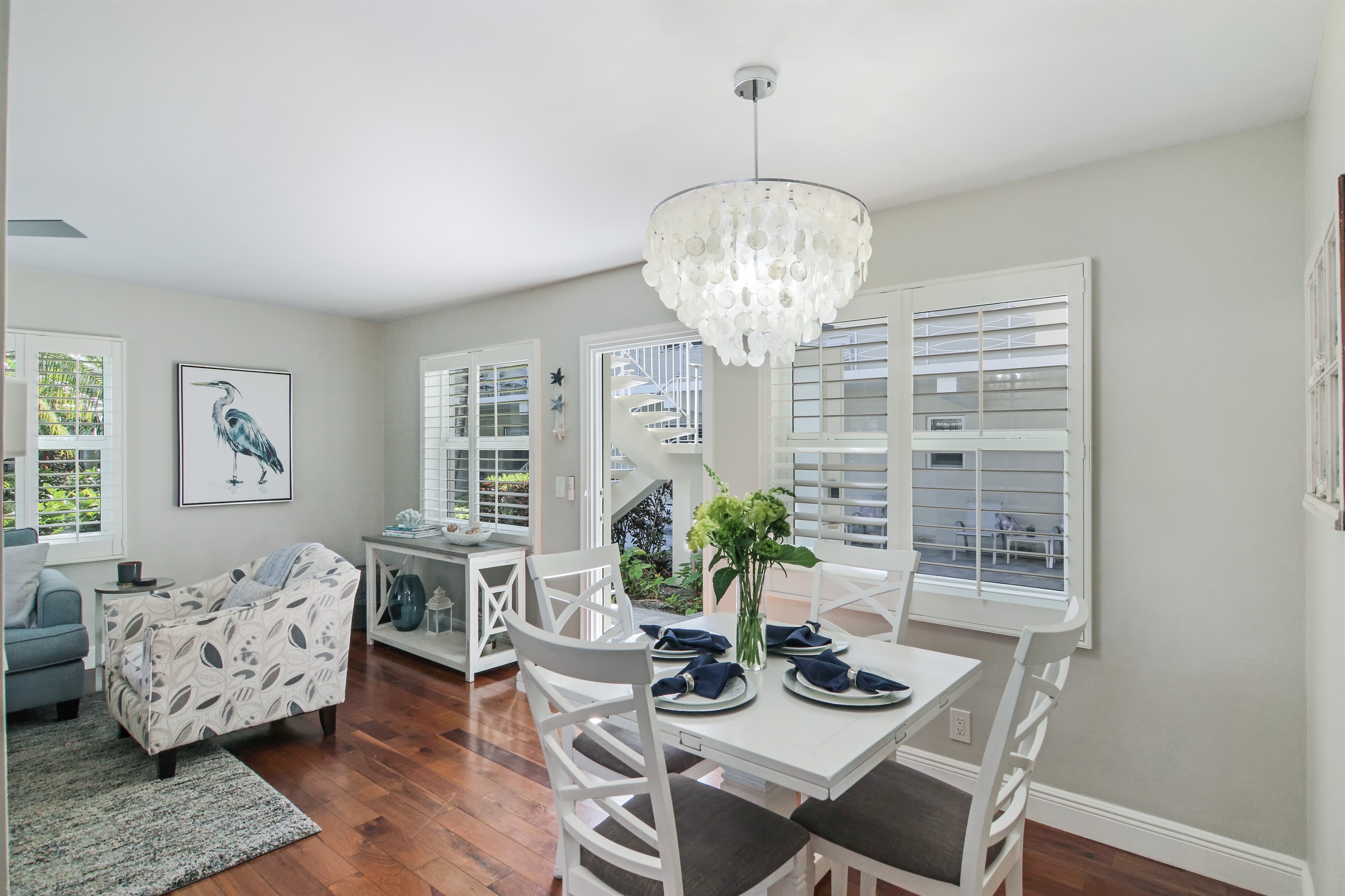 Dining seating for 4 with a courtyard view