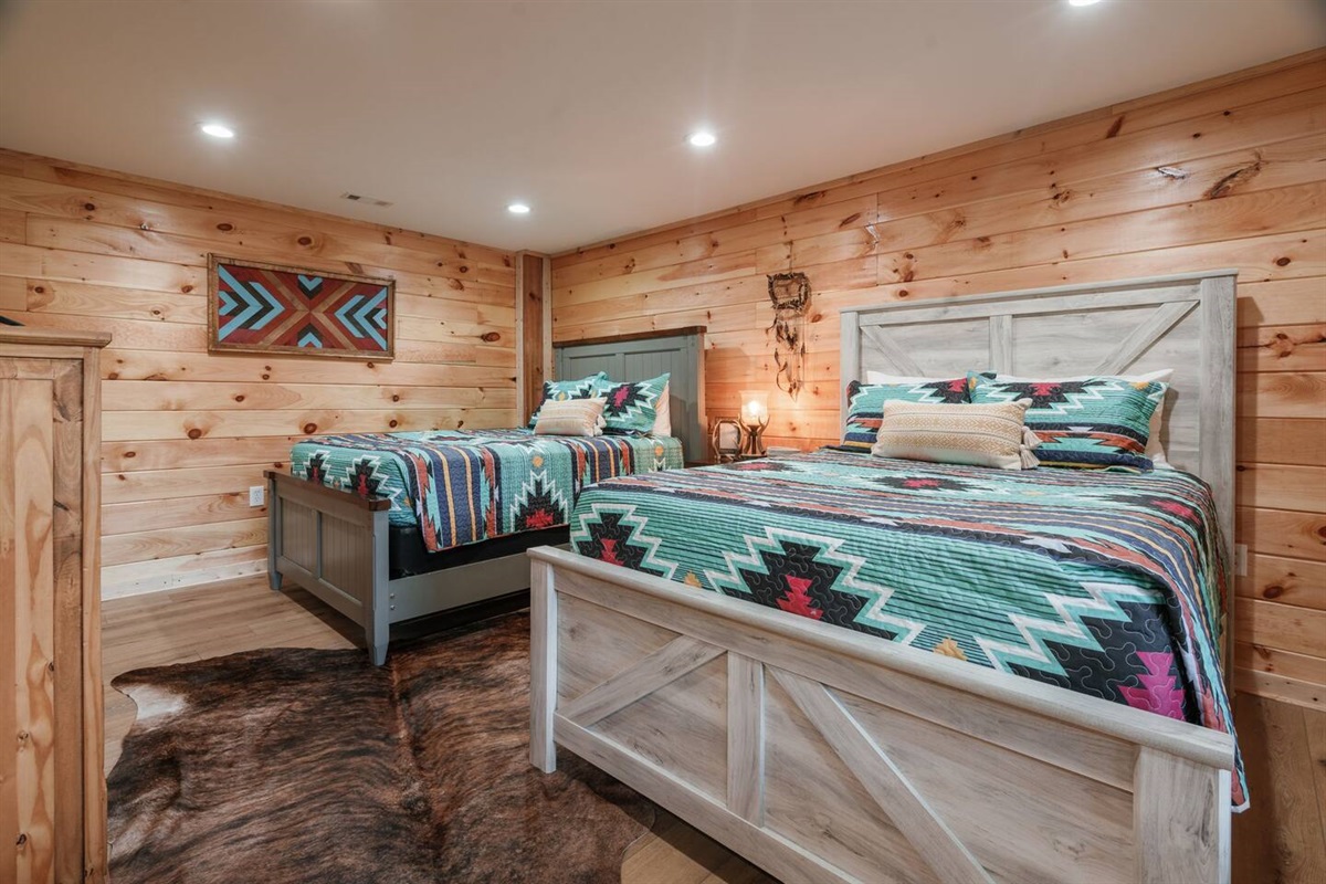 Downstairs queen bedroom with ensuite bathroom.