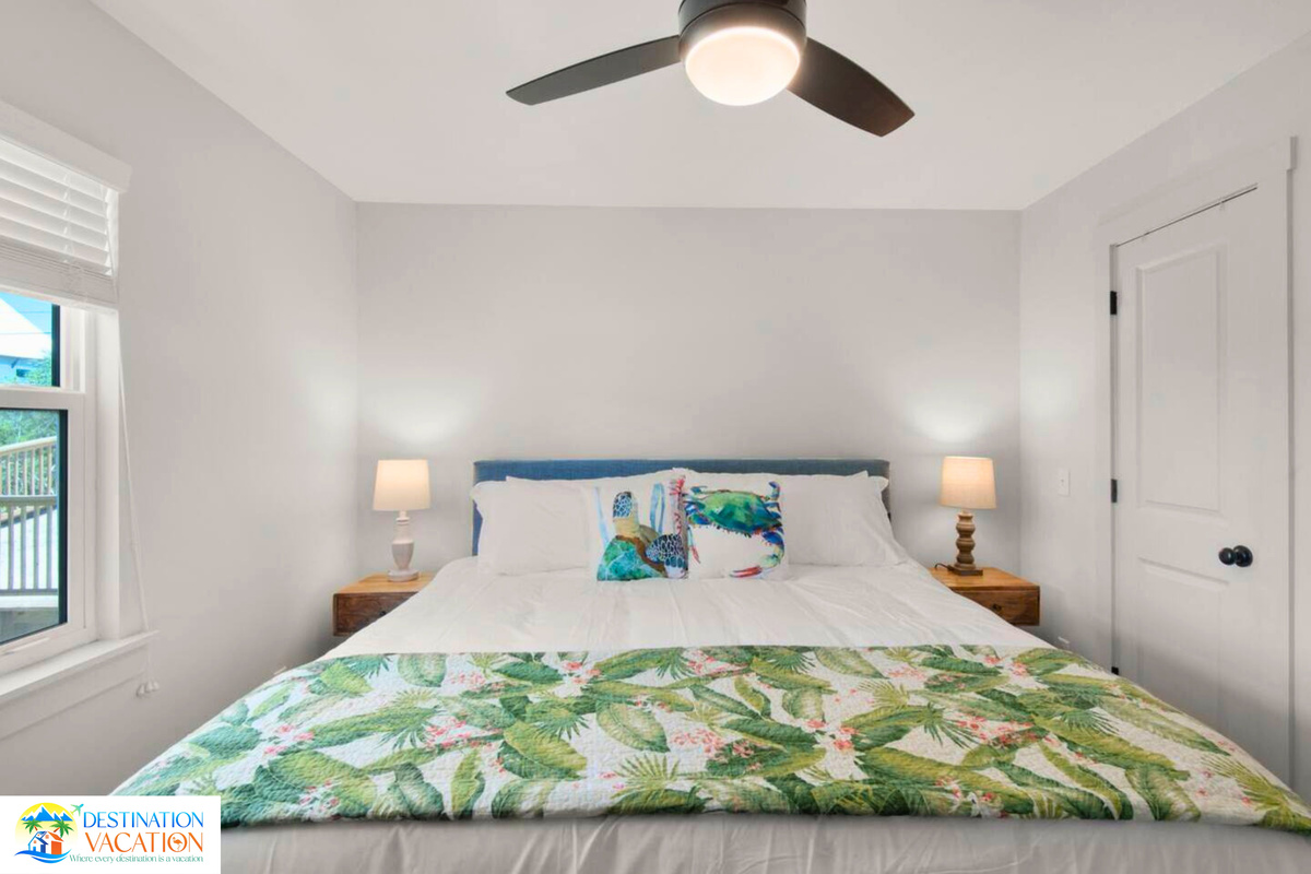 Serene bedroom welcomes you after sunny beach days.