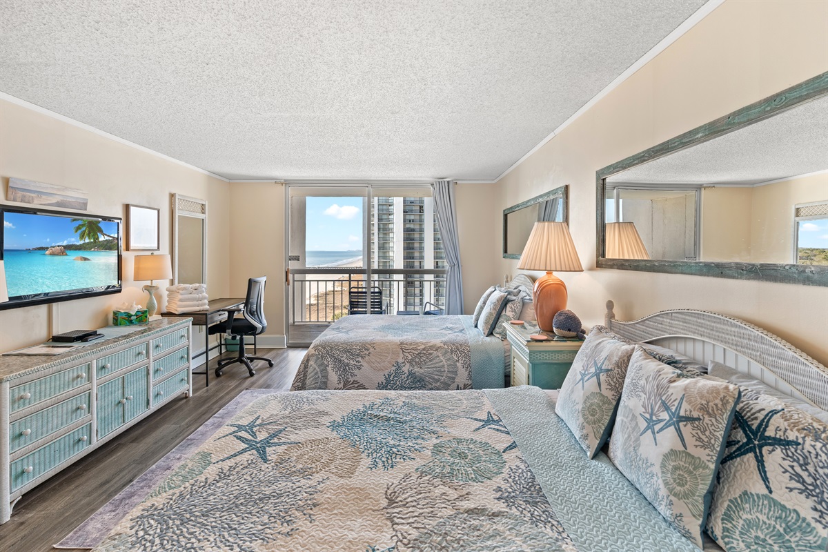 2 Queen beds with microwave, mini fridge, coffee pot and work space area