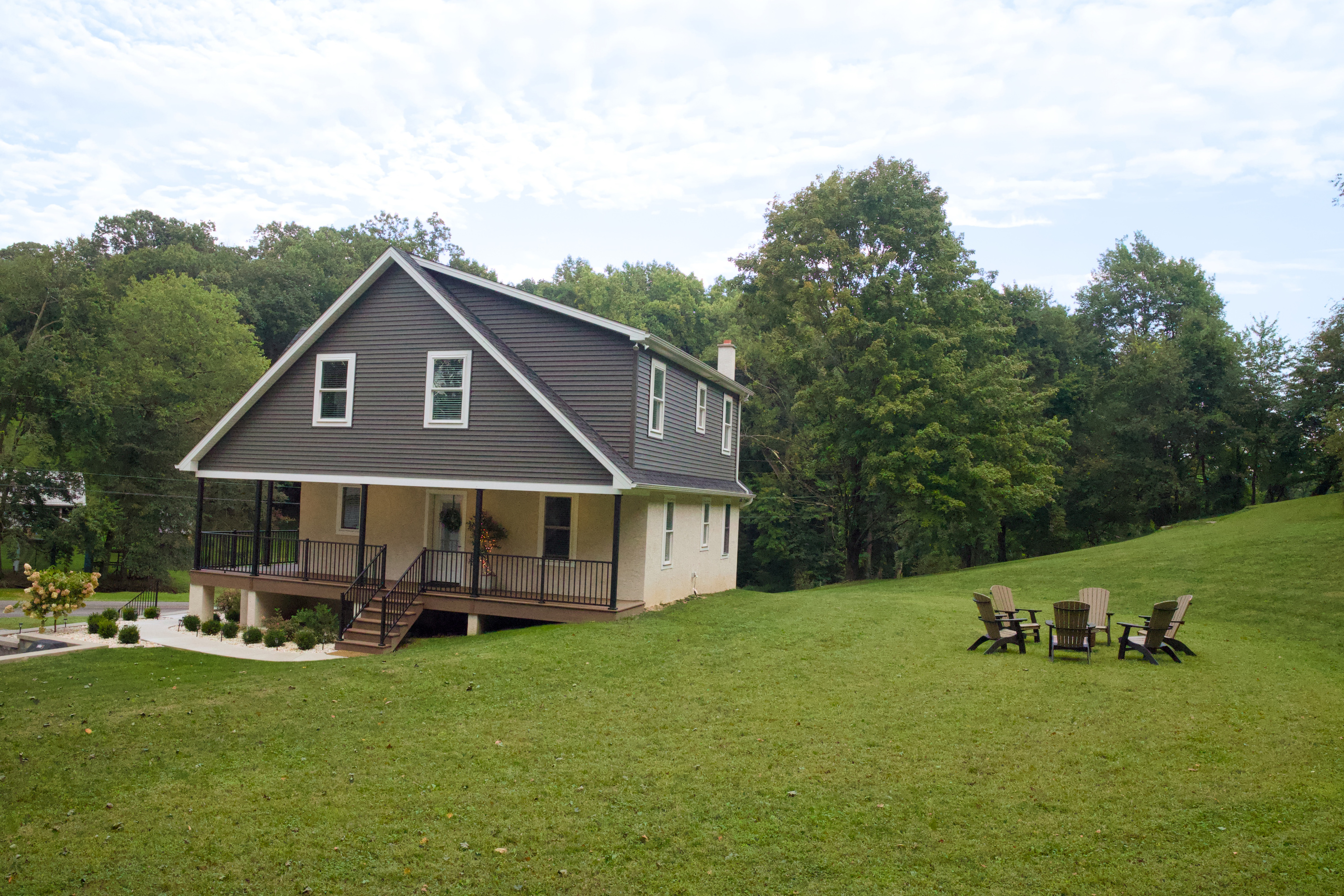 Back yard view with fire pit (yes, we have firewood for you!) 