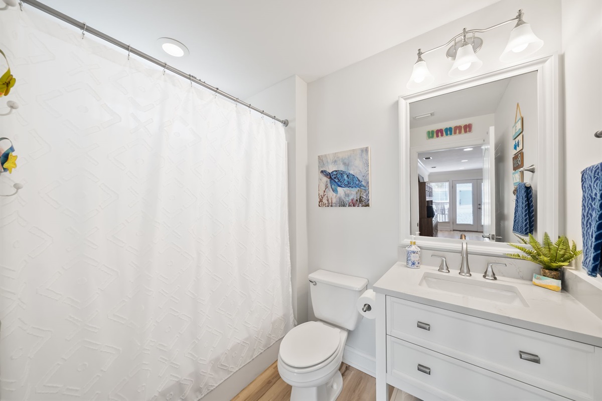 2nd floor full bathroom with a shower/tub combination.