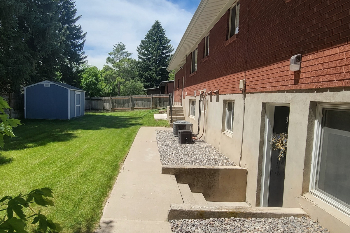 Backyard, the entrance to the apartment is to the bottom right of this photo.