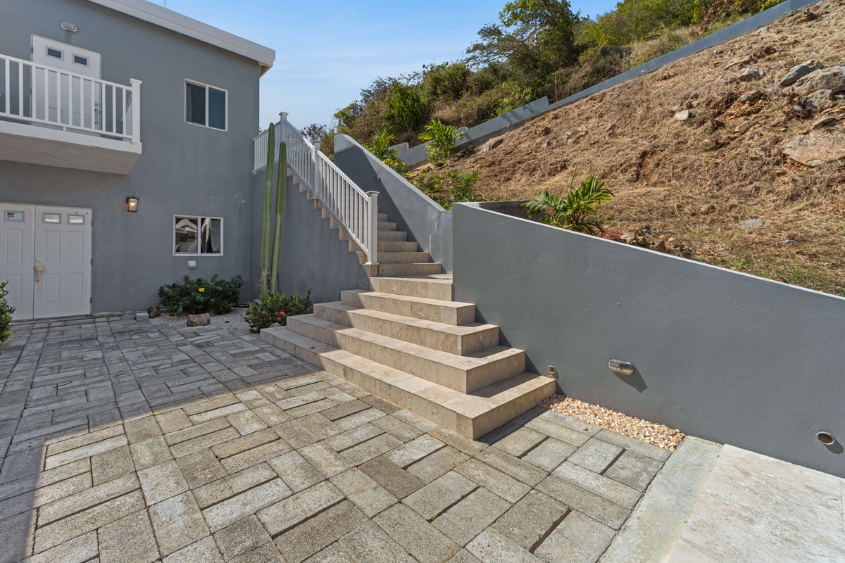 Pathway from the pool area guiding you to the main entrance.