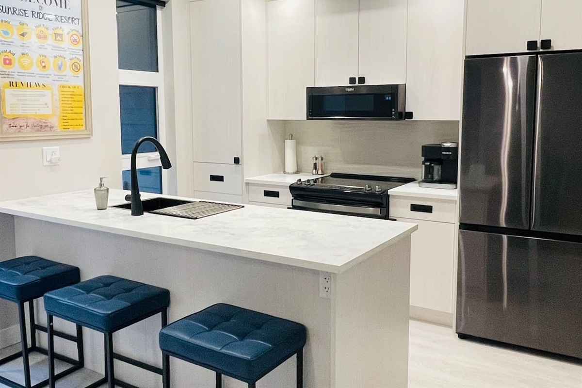 Kitchen - brand new appliances (dishwasher, microwave oven and fridge), equipped with Coffee Maker, Kettle, Blender, Toaster, and Dinnerware to host up to 6 Guests comfortably.