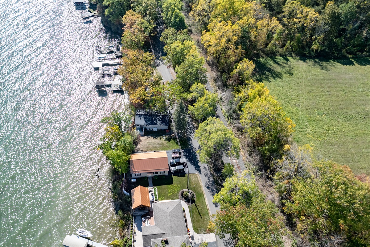 Your own slice of paradise with a private dock and crystal-clear water just steps away.