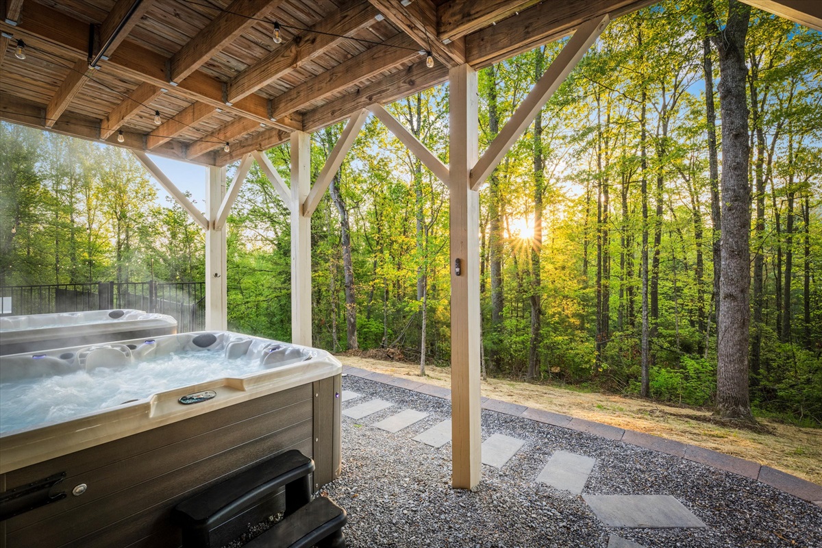 Slip into the steaming bubbles as the sun slips through the trees. Whether you're sharing stories under the string lights or stargazing in silence, these twin hot tubs are your front-row seat to mountain magic.