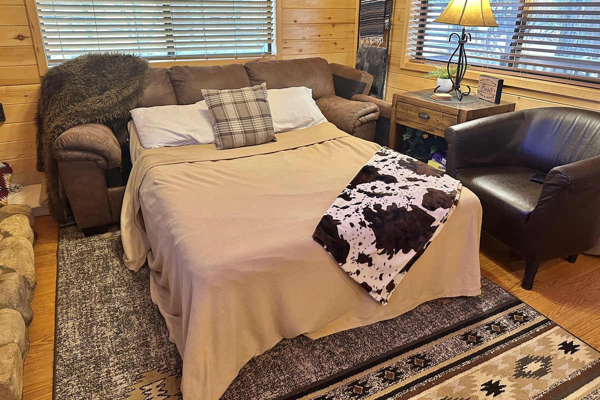 Full pull out bed in the couch offers an extra sleeping space to accommodate up to 6 guests. 