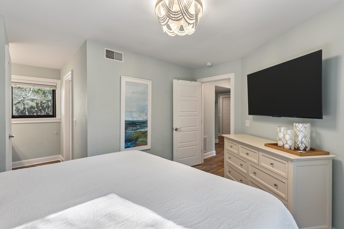 Primary suite with king bed and full bathroom